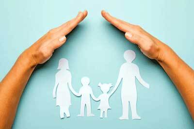 Hands covering a family, representing protection