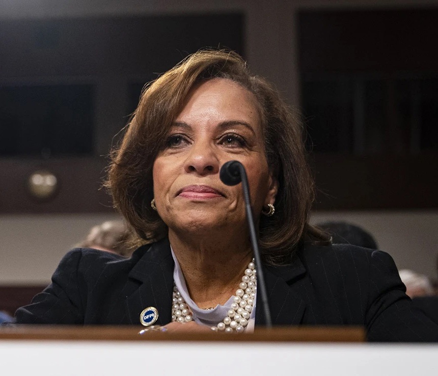Commissioner speaks at a meeting