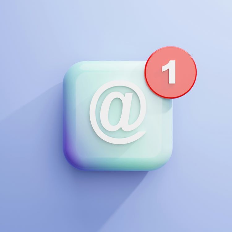 3D icon of a blue square with a white "@" symbol and a red notification badge showing "1" in the top-right corner, on a light blue background.
