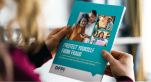 holding the printed booklet: Protect Yourself From Fraud