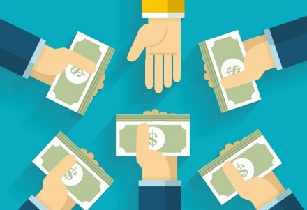 Many hands are holding bills and a hand is reaching out to receive the bills