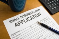 A application form and a pen